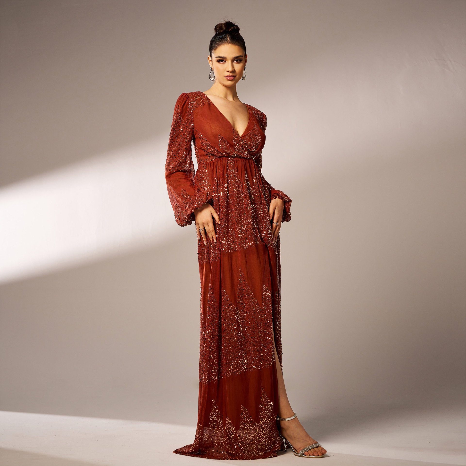 Elegant beaded gown showcasing high-end fashion in ملابس for evening events
