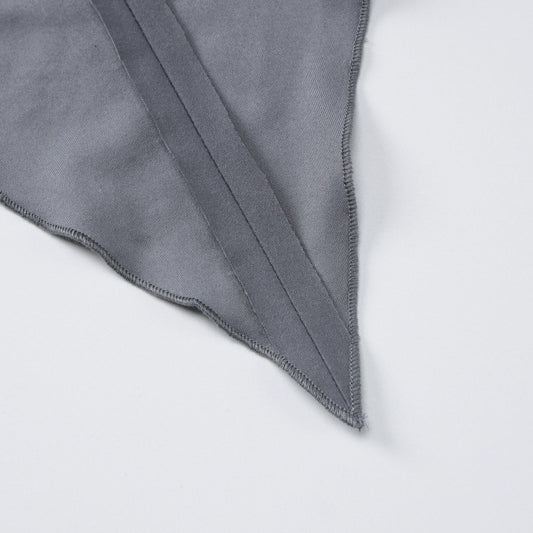 Gray fabric triangle with stitched edges, part of shoulder collar long sleeve women suit