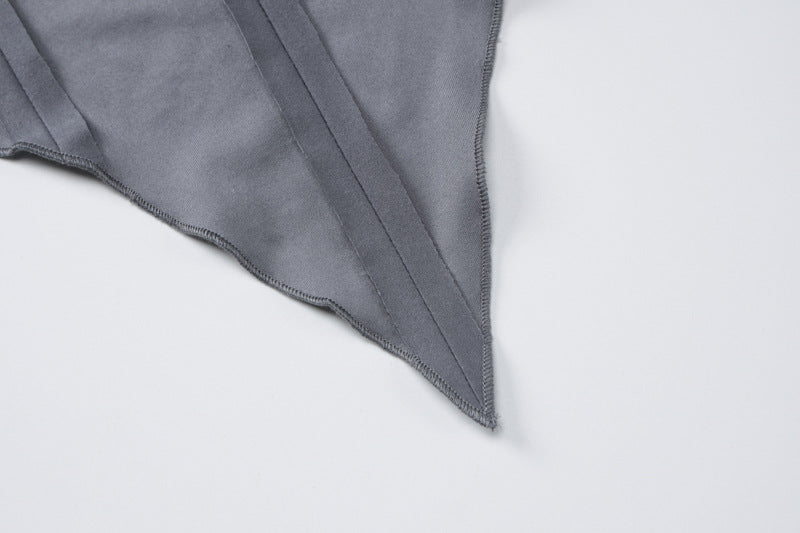 Gray fabric triangle with stitched edges, part of shoulder collar long sleeve women suit