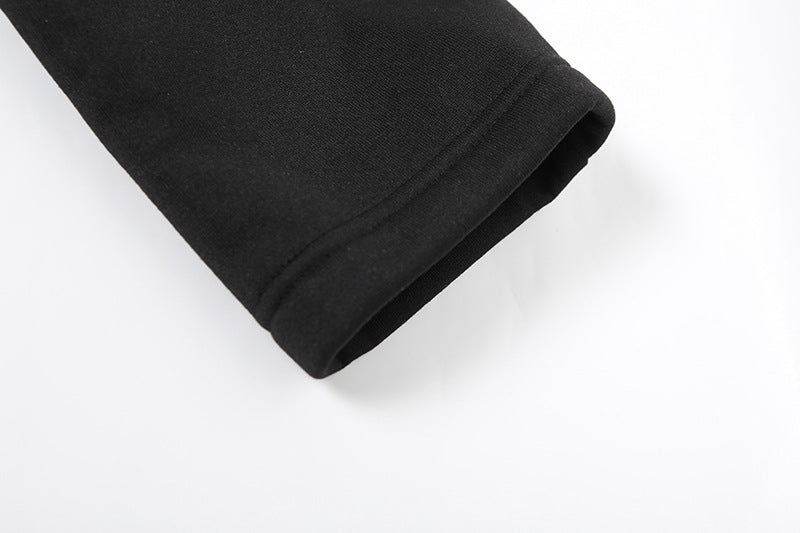 Black fabric sleeve of a Casual High Waist Skirt Suit, highlighting stylish langry fashion