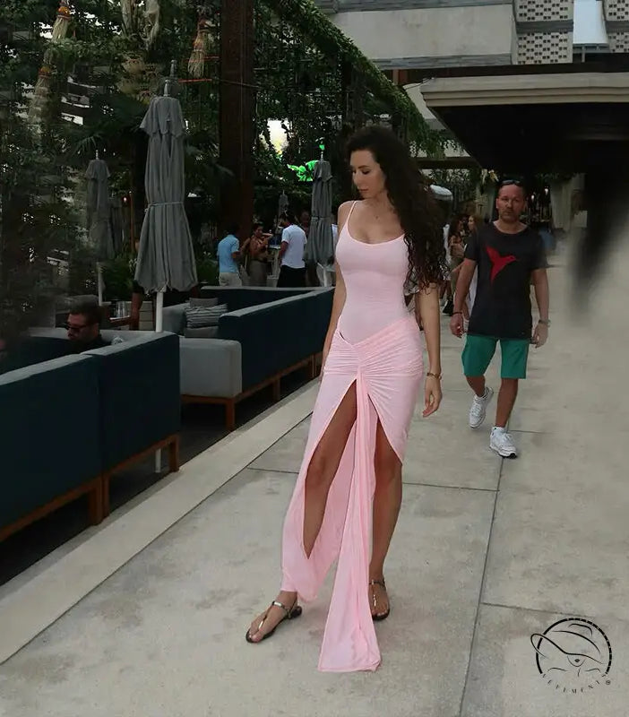 Gorgeous langry high slit maxi dress in flowing light pink satin with draped front