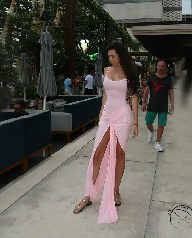 Gorgeous langry high slit maxi dress in flowing light pink satin with draped front