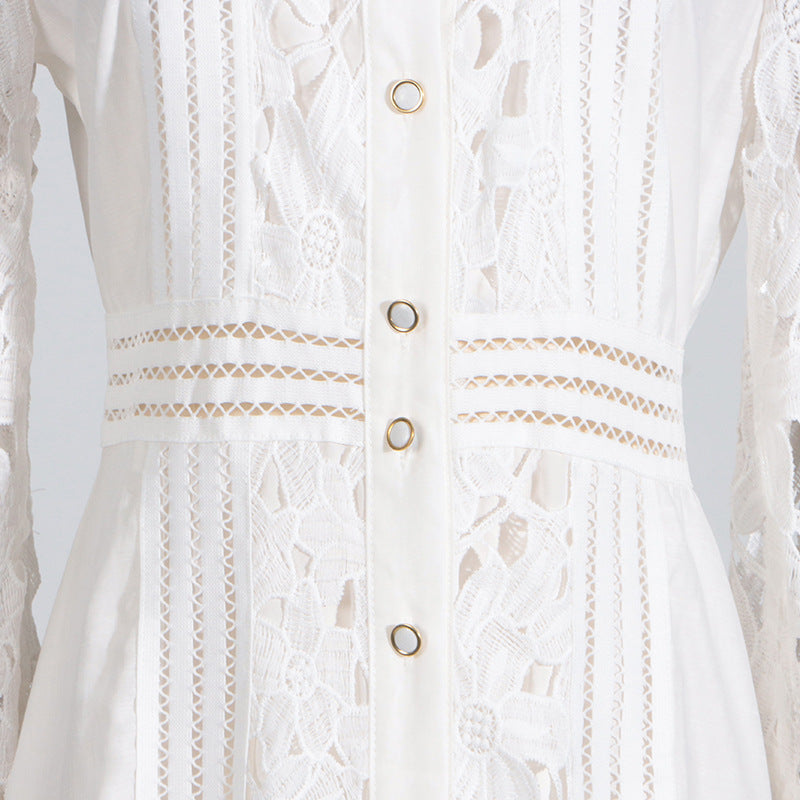 White lace maxi dress with buttons, featuring elegant embroidery and a collared design