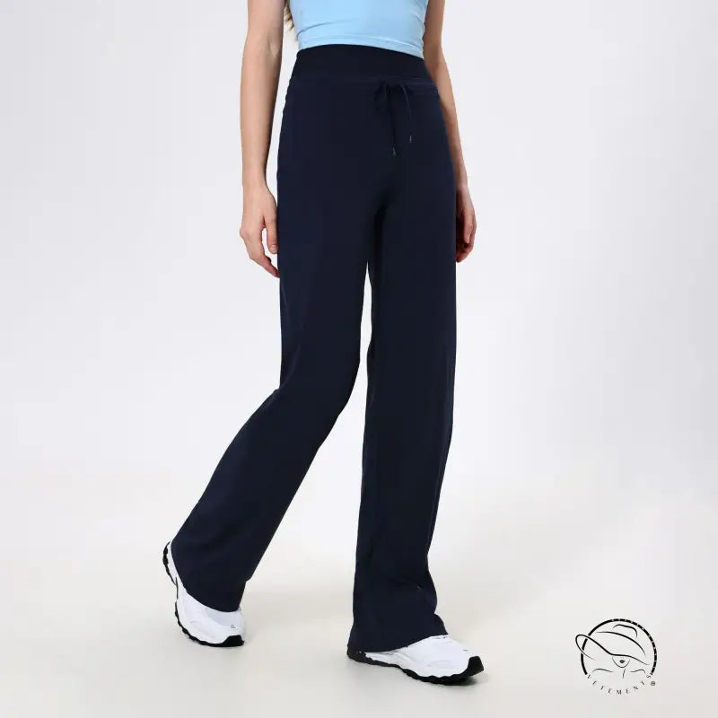 Navy blue wide-leg langry fashion trousers with white sneakers