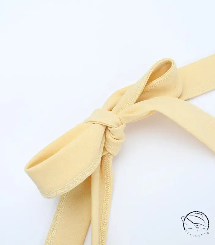 Yellow satin ribbon bow tie knot on Langry halter A-line evening maxi dress