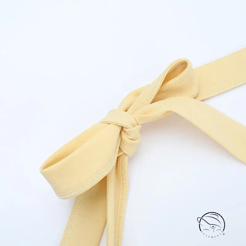 Yellow satin ribbon bow tie knot on Langry halter A-line evening maxi dress