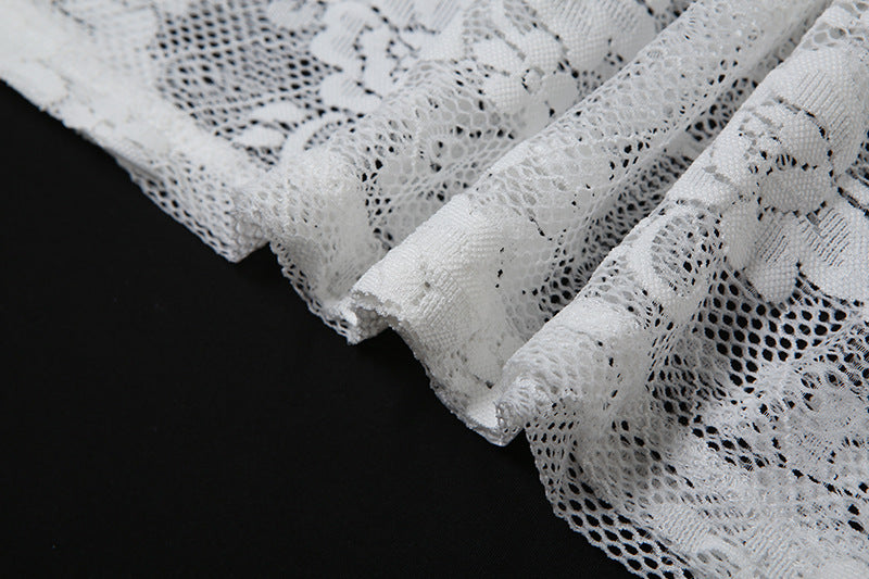 Delicate white floral lace fabric from the mesh halter dress, perfect for a halter dress look