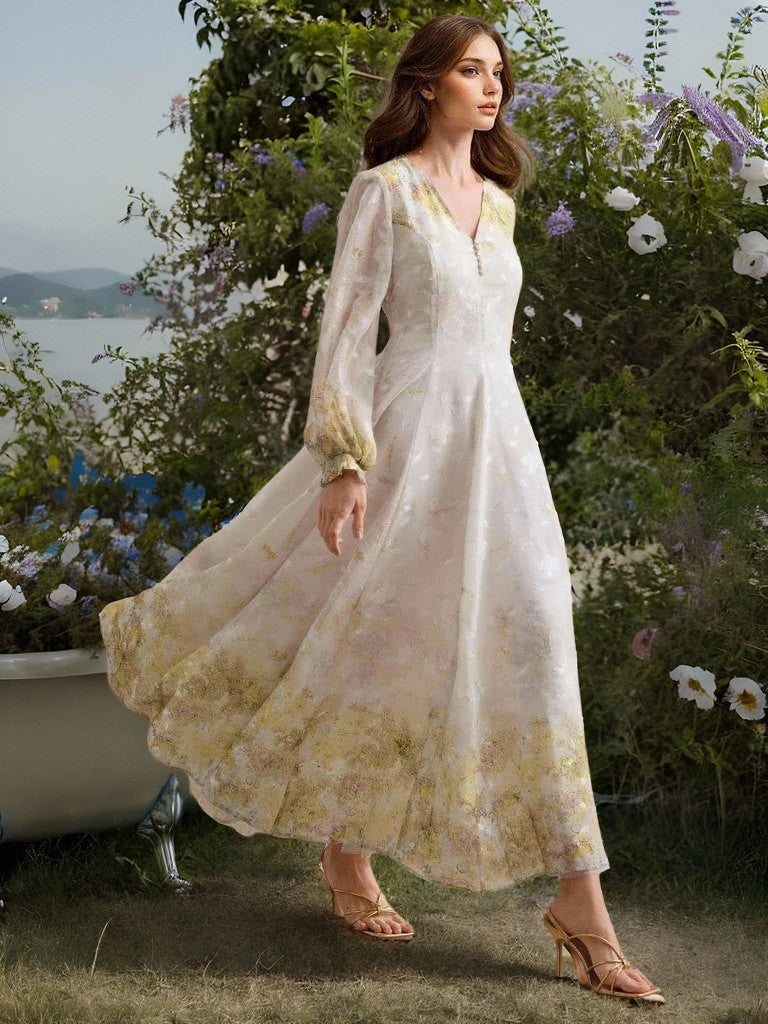 Enchanting Heavy Industry maxi dress: white lace with gold floral embroidery, long sleeves