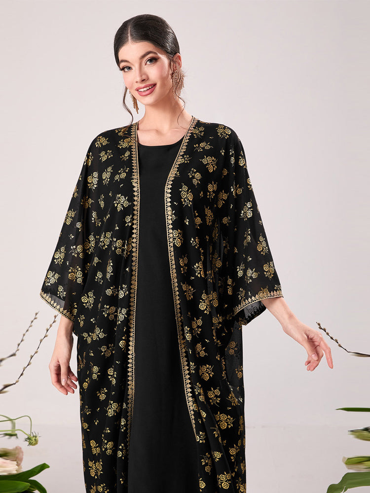Langry black floral kimono with gold accents and zipper details, elegant fashion dress