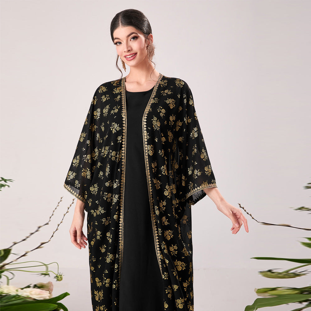 Langry black floral kimono with gold accents and zipper details, elegant fashion dress