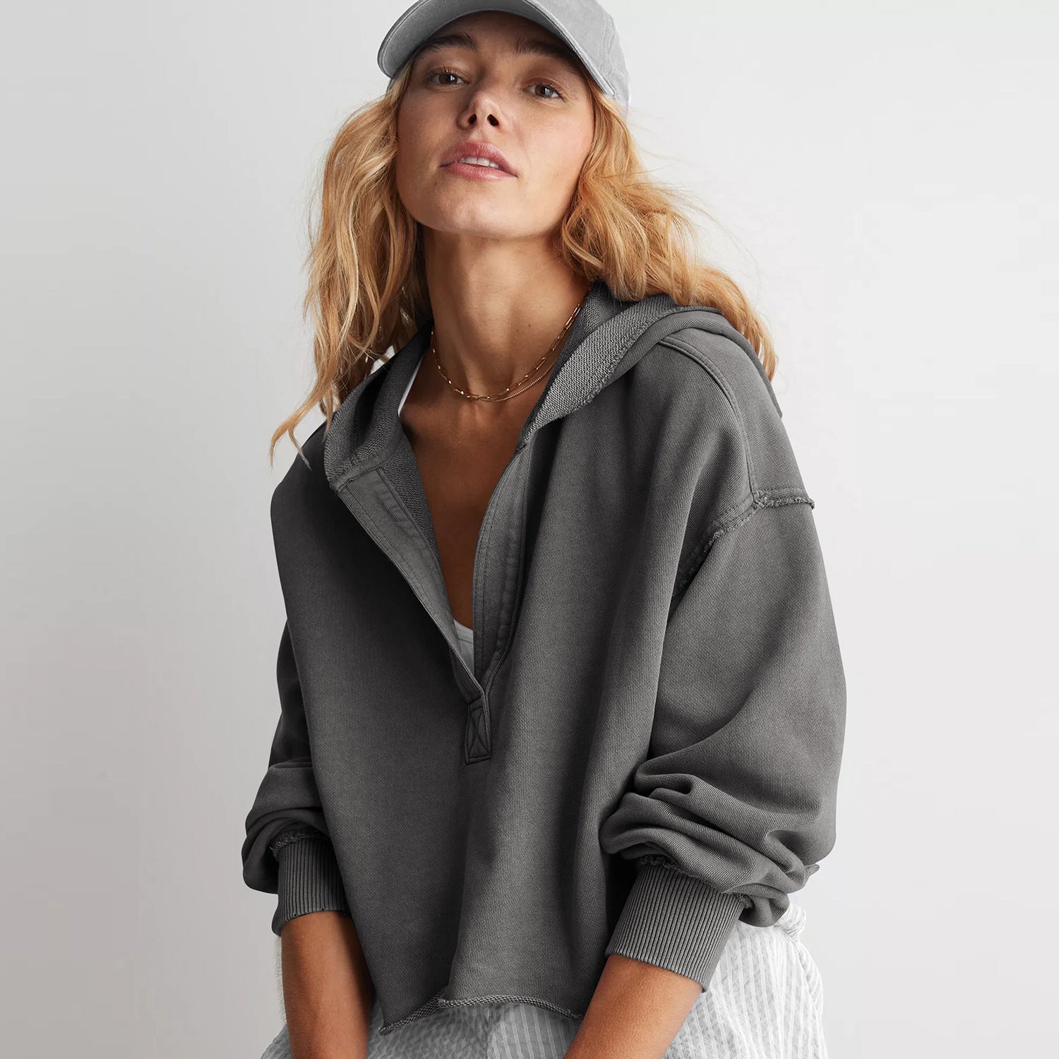Gray half-zip hooded sweatshirt with ribbed cuffs ideal for cozy fashion and langry ملابس