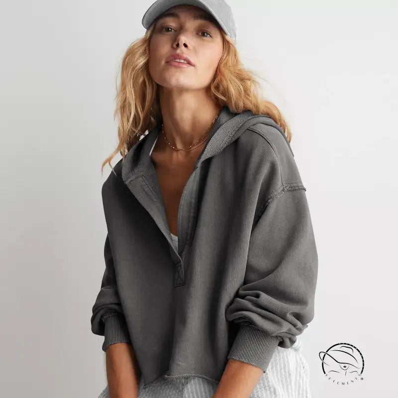 Gray half-zip hooded sweatshirt with ribbed cuffs, cozy loose fashion ملابس