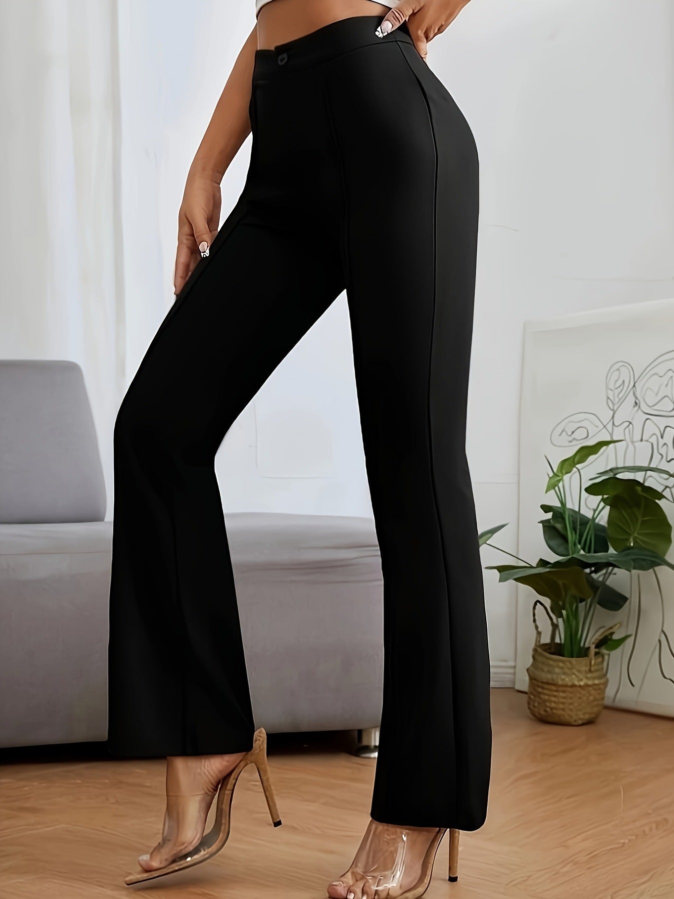 Black flared dress pants with metallic stiletto heels for stylish casual fashion