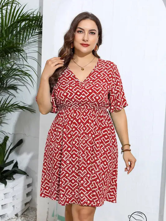 Casual v neck loose dress in red and white geometric print with flutter sleeves
