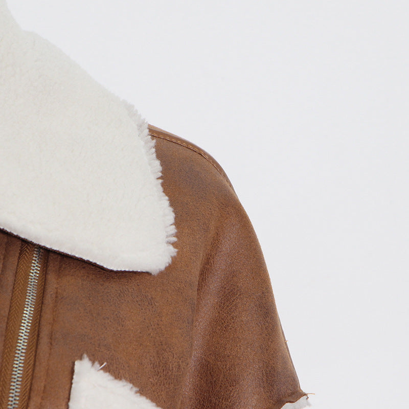 Stylish brown faux leather jacket with white faux fur trim for fashion-forward women