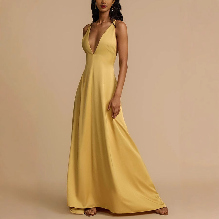 Elegant yellow satin maxi dress showcasing luxurious fashion and style for special occasions