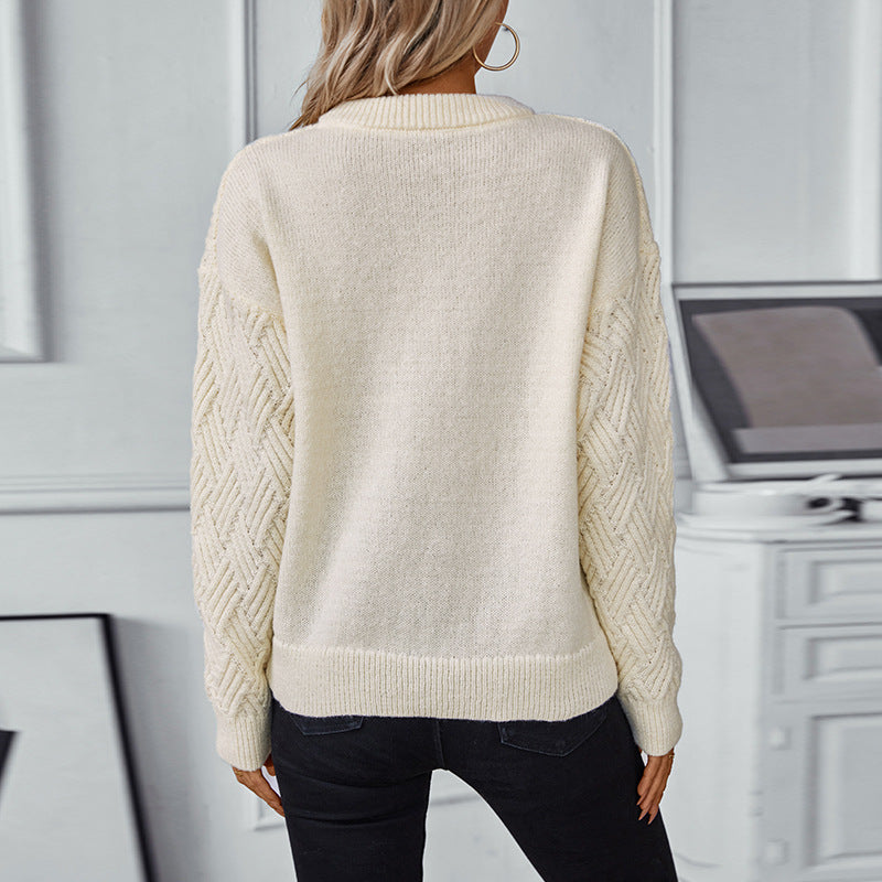 Cream cable knit crew neck sweater with retro textured pattern