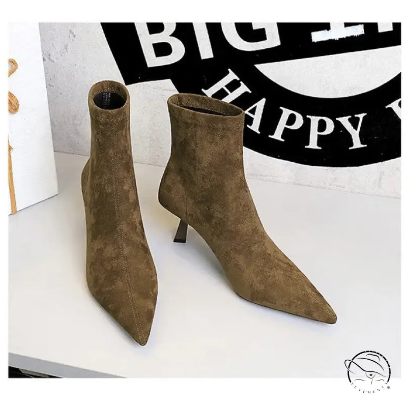 Brown suede ankle boots with pointed toes and low heels in Langry fashion