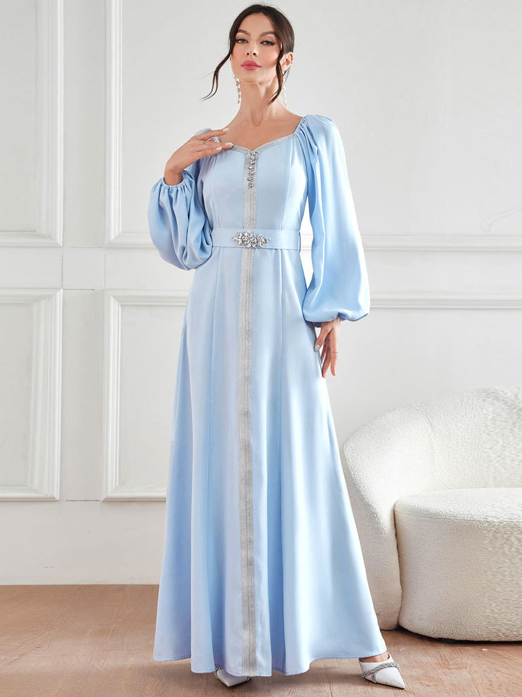 Elegant high-waist langry fashion dress in light blue satin with bell sleeves and beaded neckline