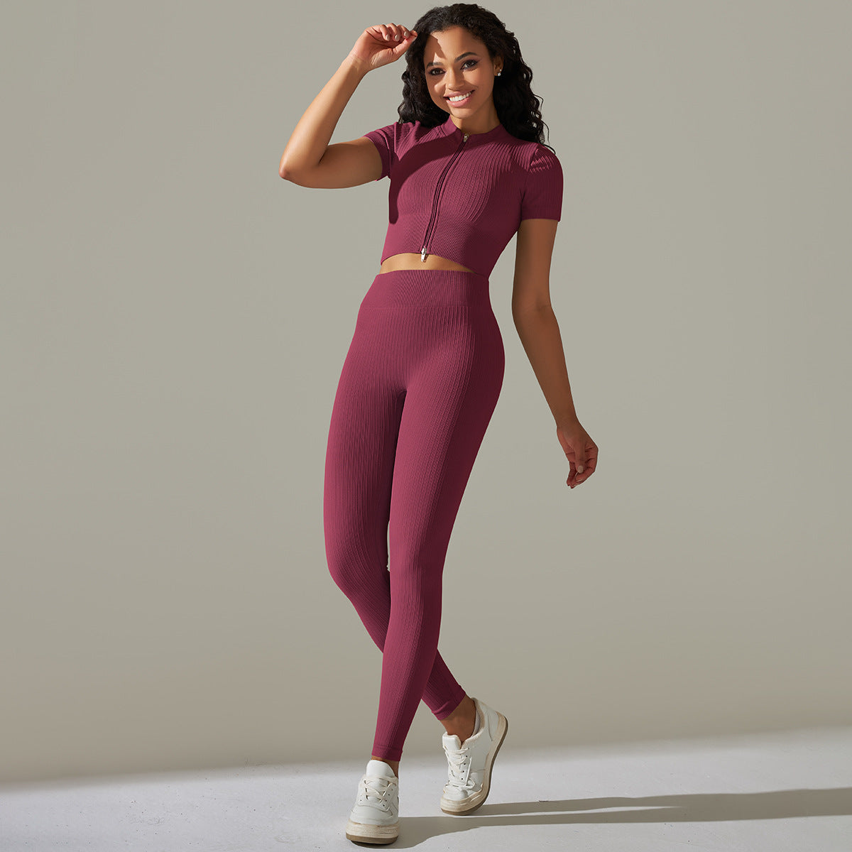 Seamless knitted peach burgundy ribbed workout set with peach hip high waist design