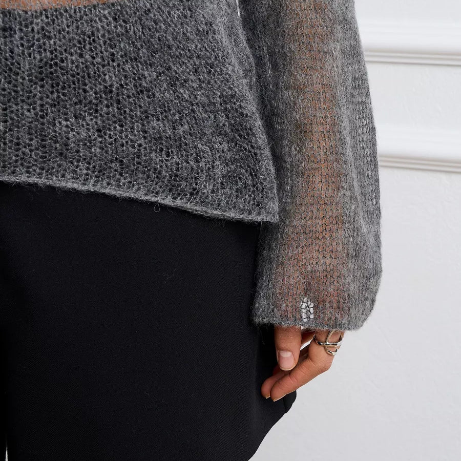 Gray knit Loose Wool Knitted Blouse paired with a black skirt showcases stylish fashion ملابس