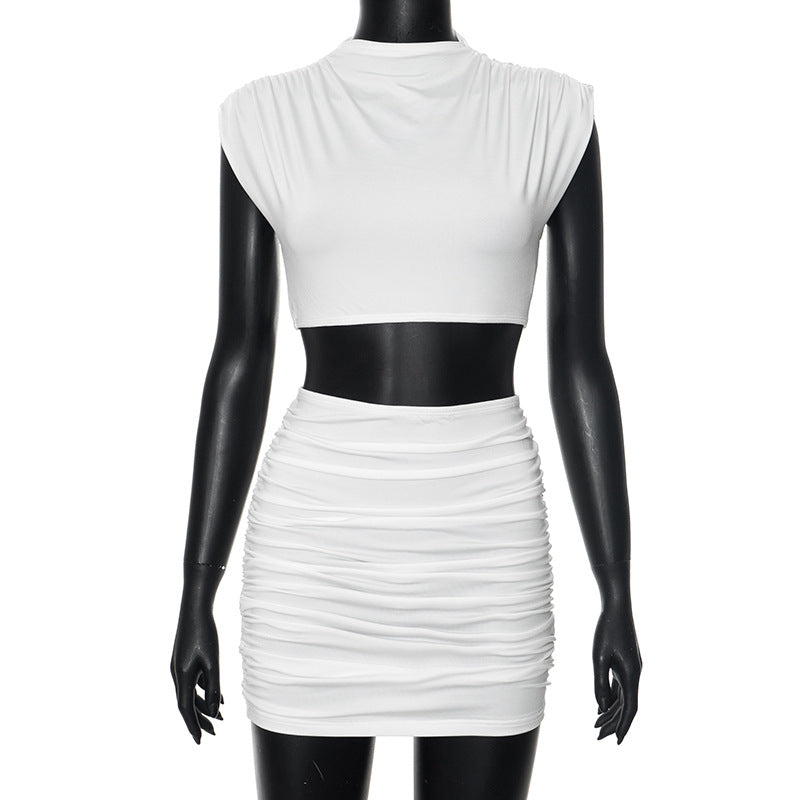 White ruched two-piece dress set featuring a crop top and mini skirt for summer fashion