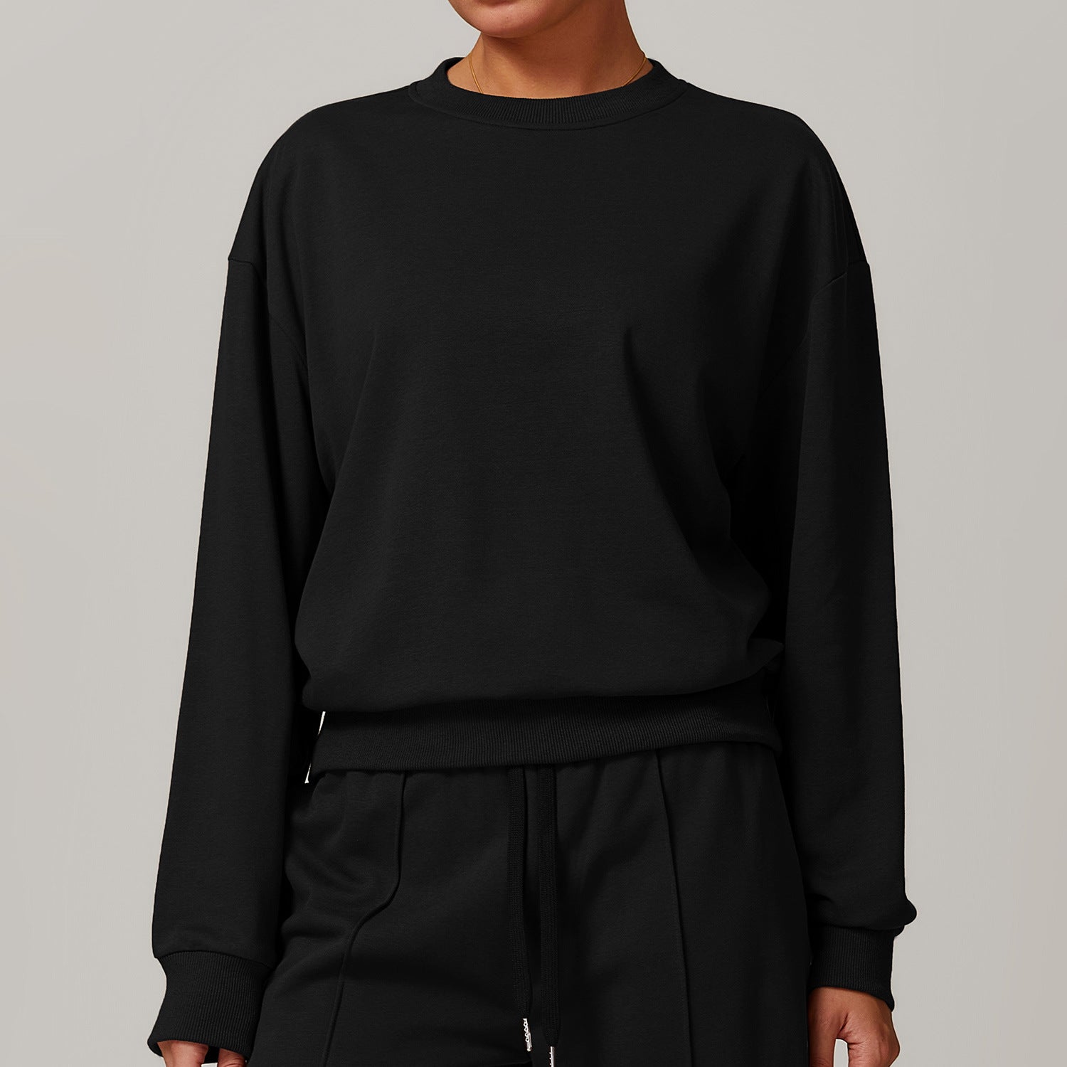 Black long-sleeved Loose Round Neck Sports Sweater by Langry for fashionable ملابس