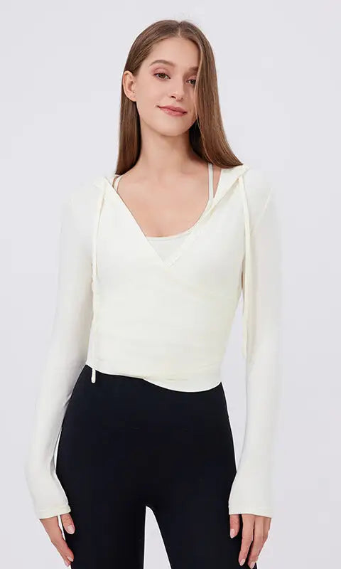 Cream-colored slim fit slimming hoodie top with V-neck and drawstring hood