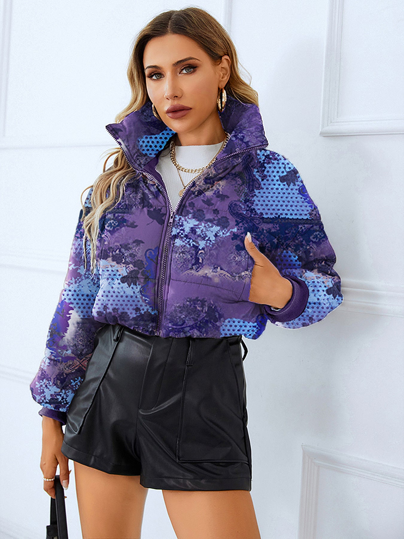 Purple patterned puffer jacket from Langry, a stylish choice in ملابس for warmth and elegance