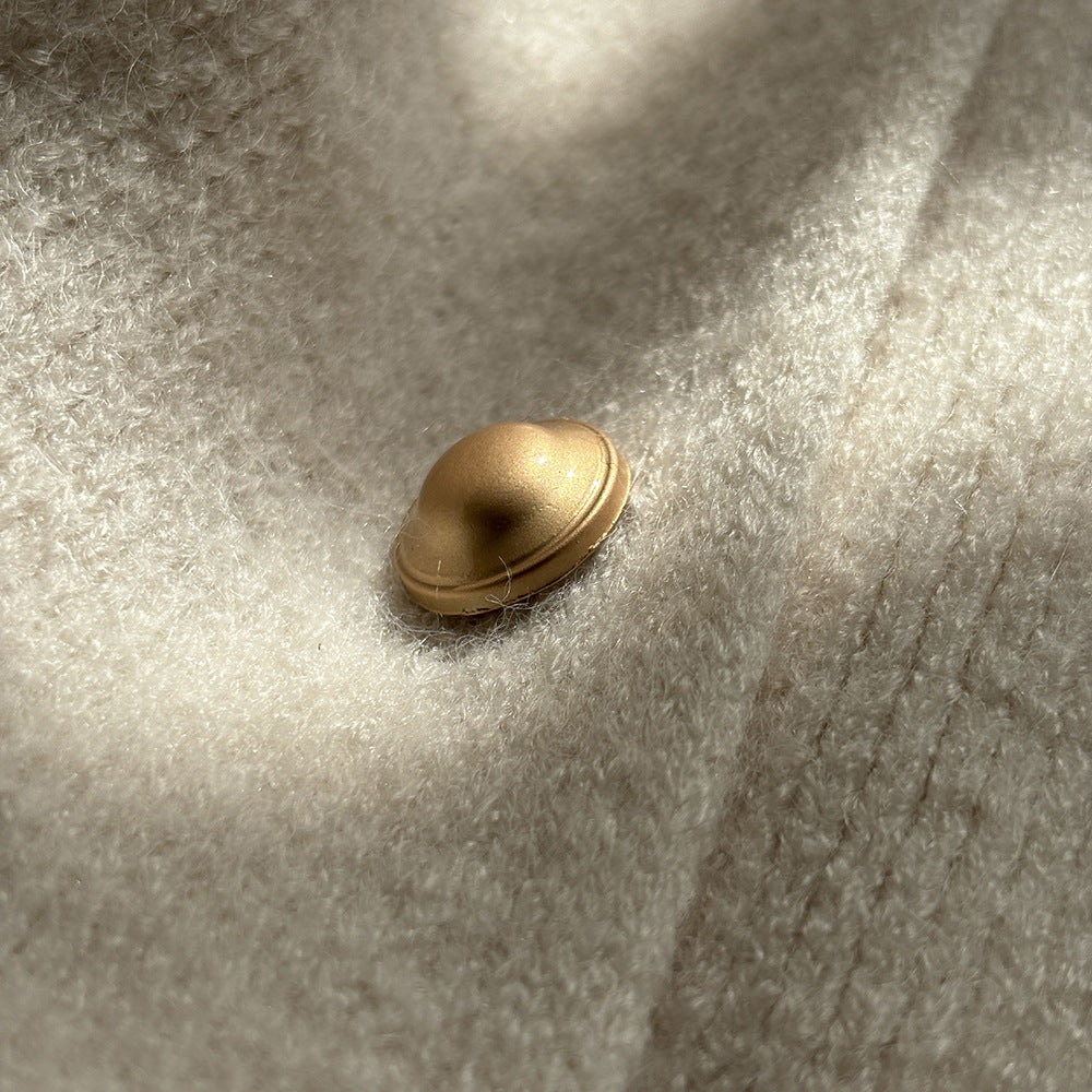 Gold dome button on Gentle Knitted Vest showcasing elegant langry fashion and ملابس style