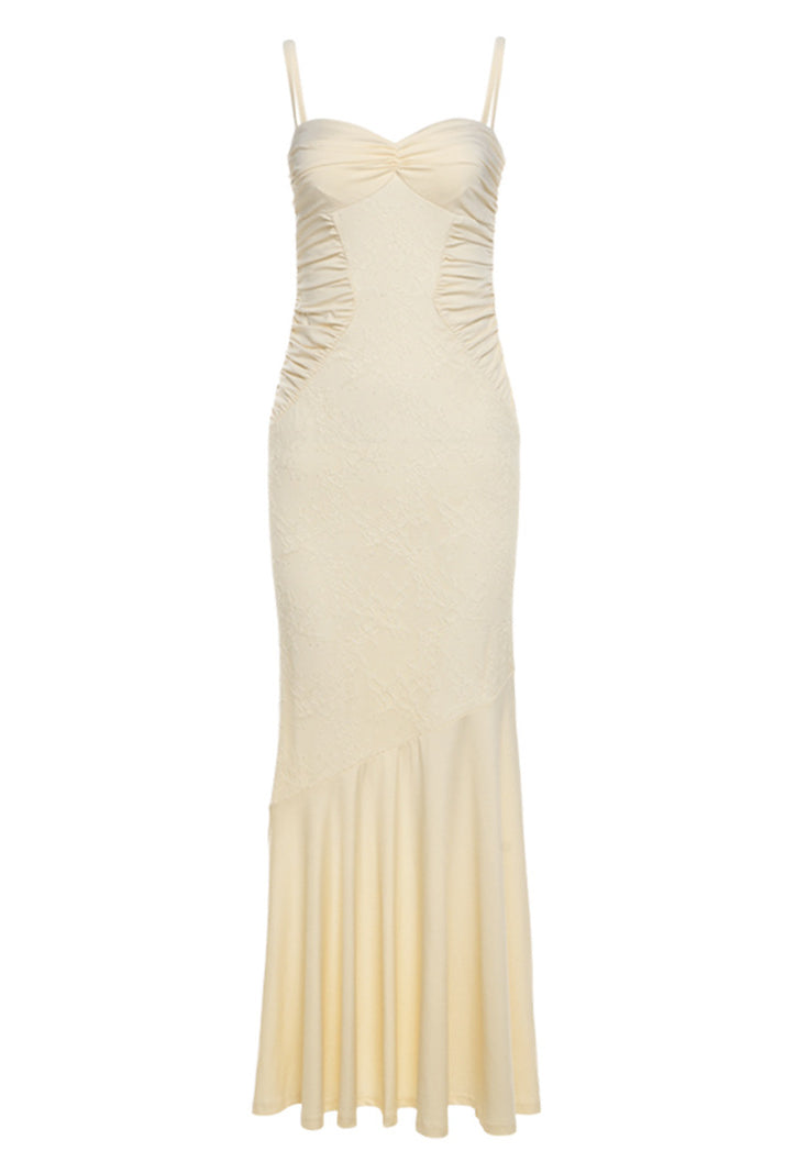 Elegant Cami Dress featuring cream-colored, floor-length design with spaghetti straps