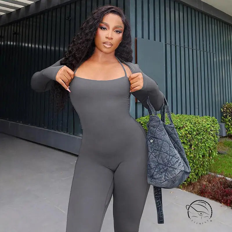 Woman in gray casual tight jumpsuit two piece set