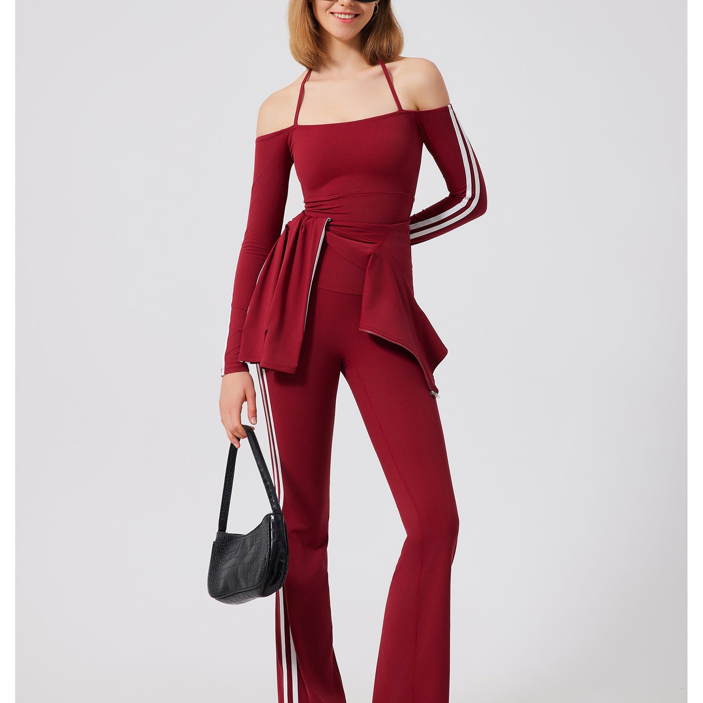 Burgundy off-shoulder running skin friendly jumpsuit with stripes