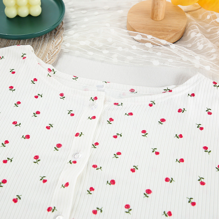 White ribbed knit top with red rose floral print, perfect for casual fashion ملابس