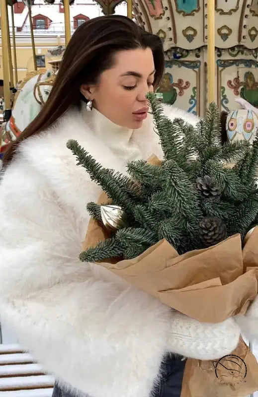 Gorgeous faux fur fox jacket in white with brown accents and gold trim from Langry fashion