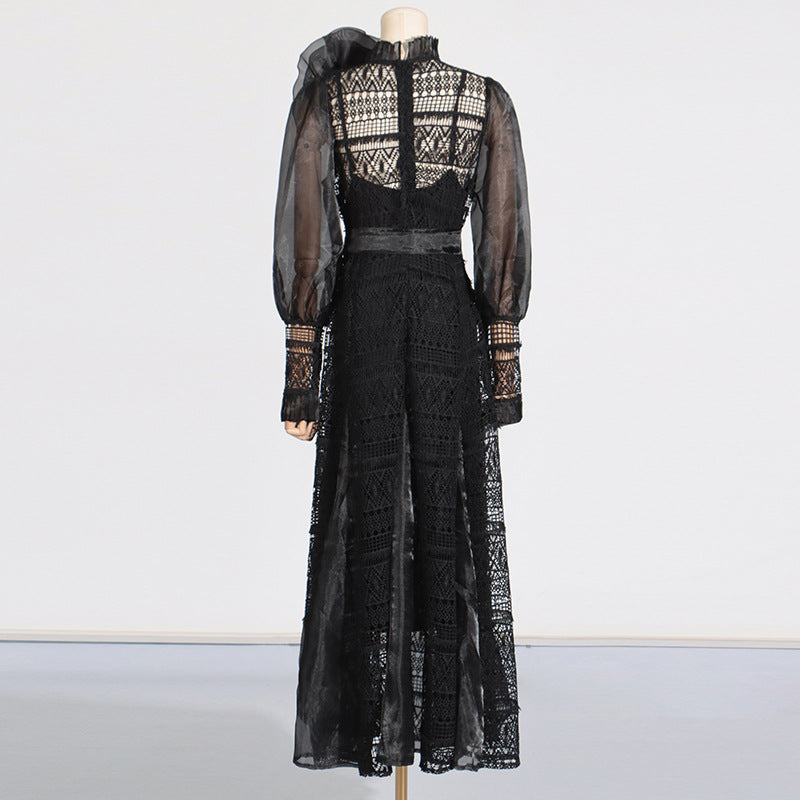 Elegant black lace maxi dress featuring lantern sleeves and floral stitching design