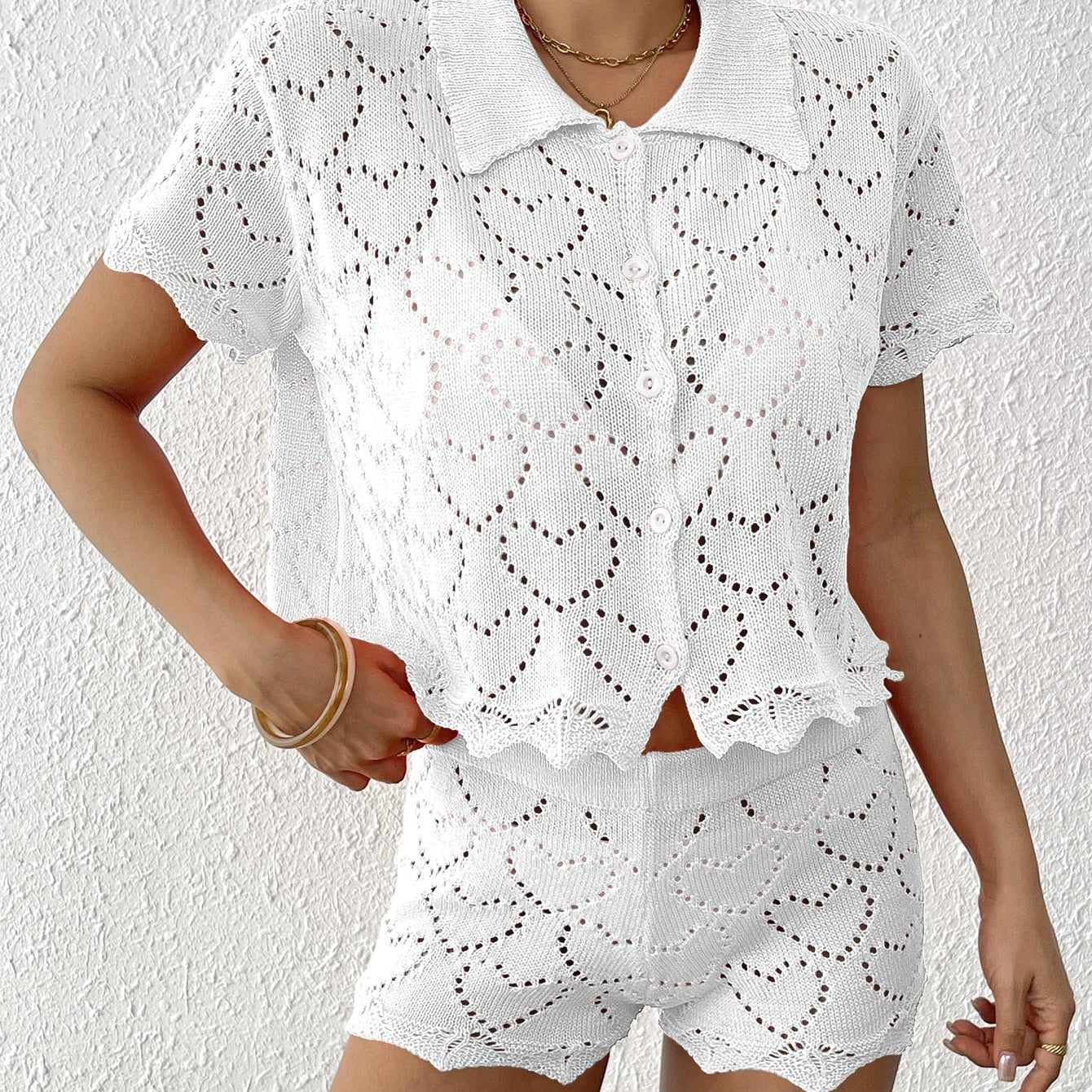 White crochet heart-patterned shorts set from Beautiful Beach Sets for stylish summer fashion