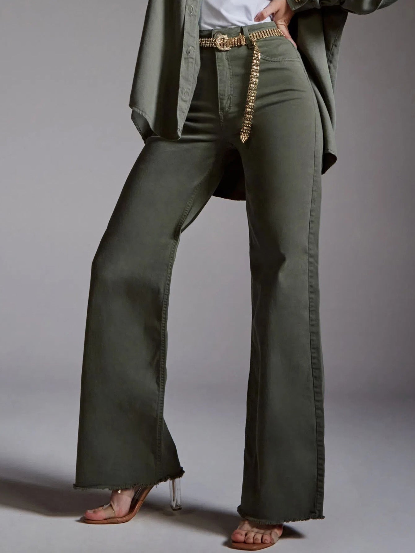 Olive green wide-leg jeans with gold chain belt from Langry fashion ملابس collection