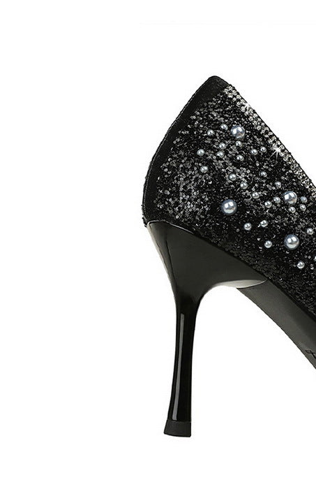 Langry black glitter stiletto pumps with pearl bowknot accents