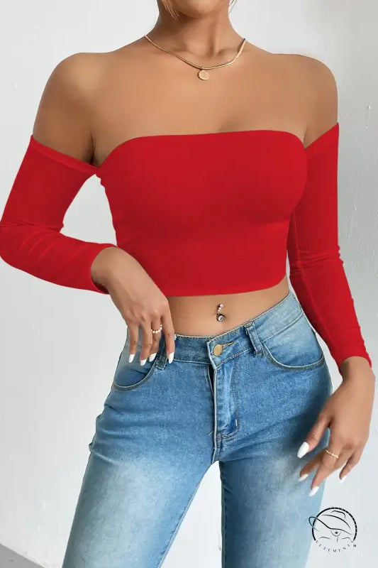 Red camisole waist trimming short sleeve crop top with light wash jeans