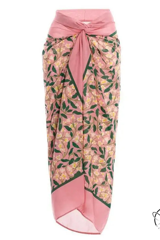 Pink floral sarong with tie waist and leaf pattern in cute bikini split swimsuit outfit