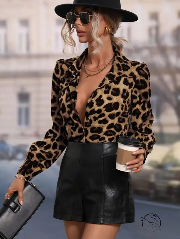 Casual leopard print long sleeved langry top with black leather skirt and hat