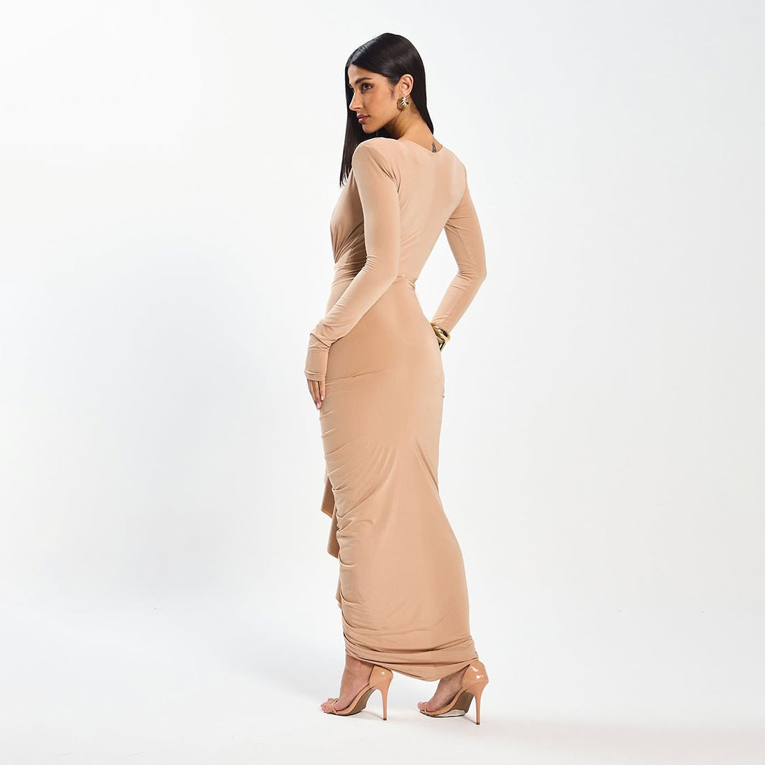 Elegant slim beige ruffled maxi evening dress with long sleeves and high heels in langry fashion