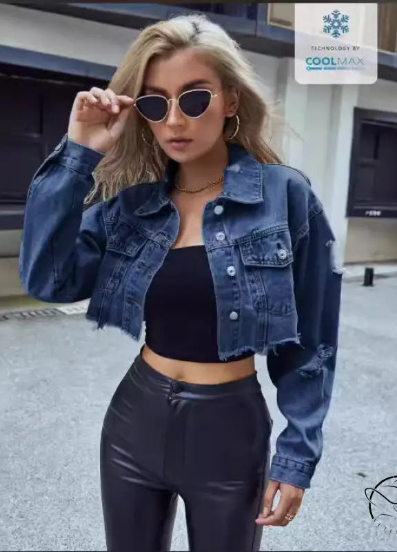 Woman in matching denim short coat with distressed cropped jacket, black top, pleather pants