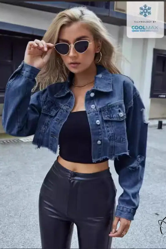 Woman in matching denim short coat with distressed cropped jacket, black top, pleather pants