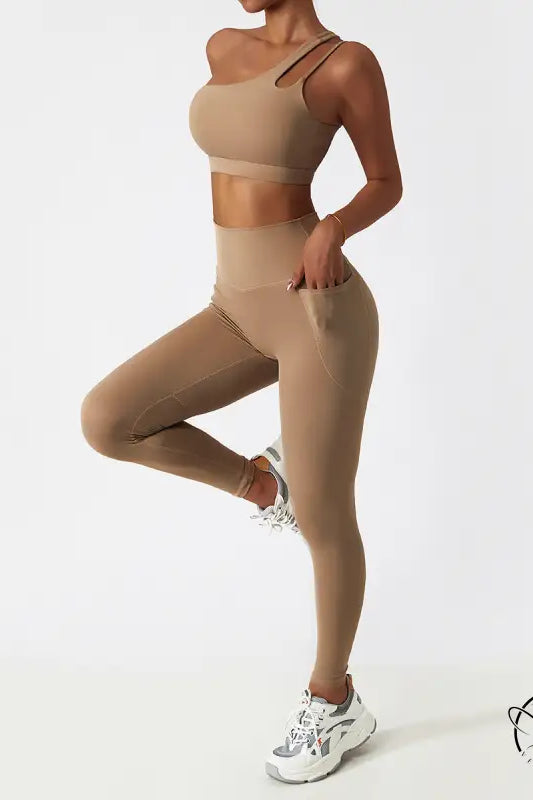 Breathable beige yoga pants set with sports bra, high-waisted leggings, white sneakers