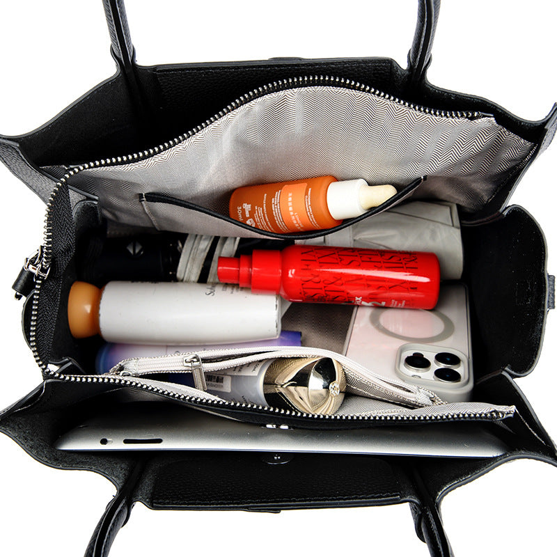 Elegant Langry genuine leather tote bag with compartments and zippers