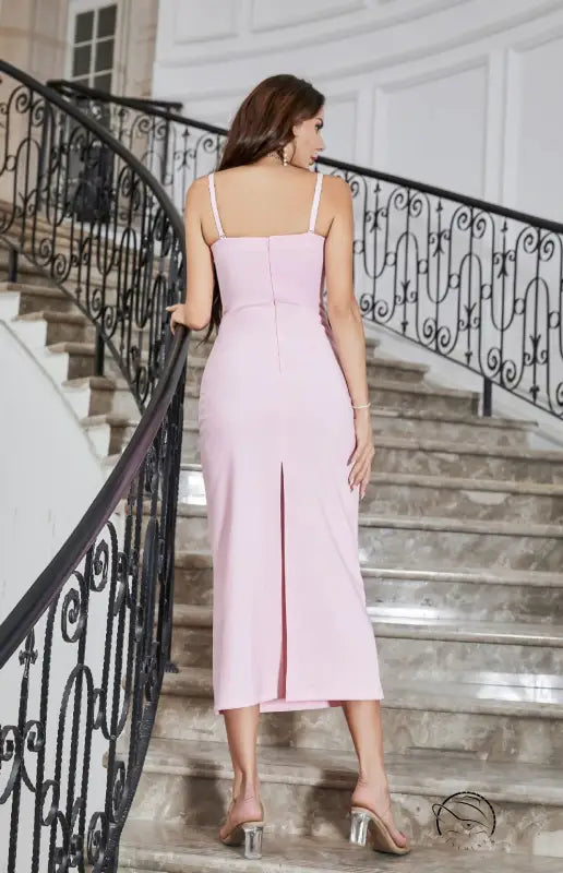 Pink sling dress with integrated fixed cups and slit midi design