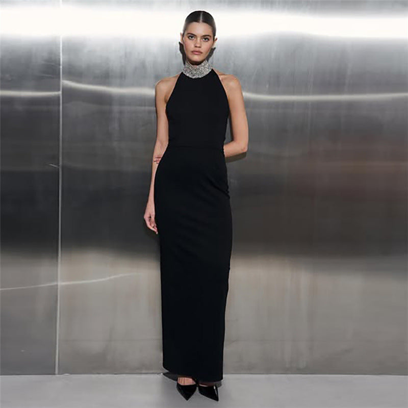 Elegant figure-flattering black dress with jeweled collar showcasing sophisticated langry fashion