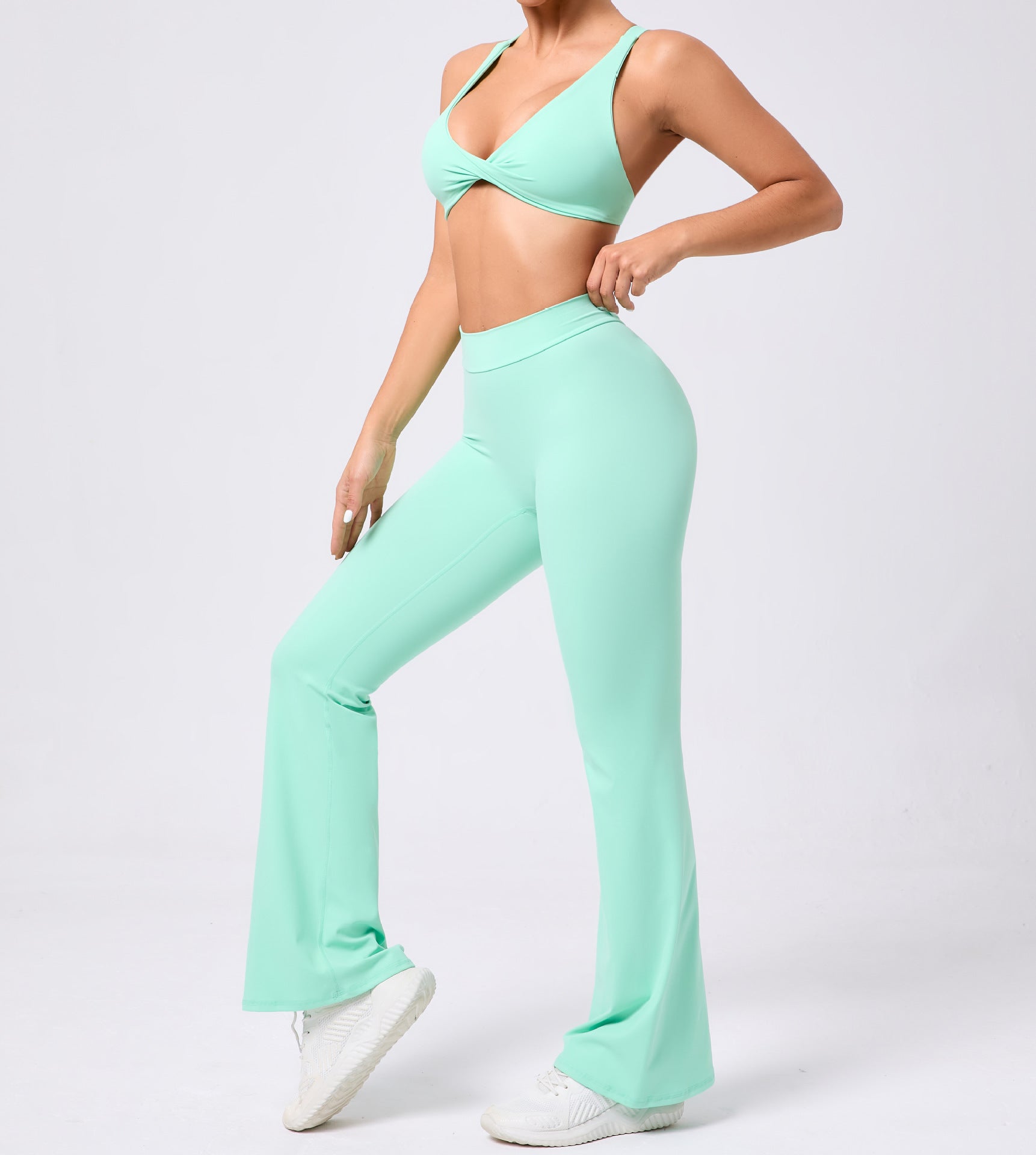 Peach tight brushed yoga pants with mint green flare and bow detail